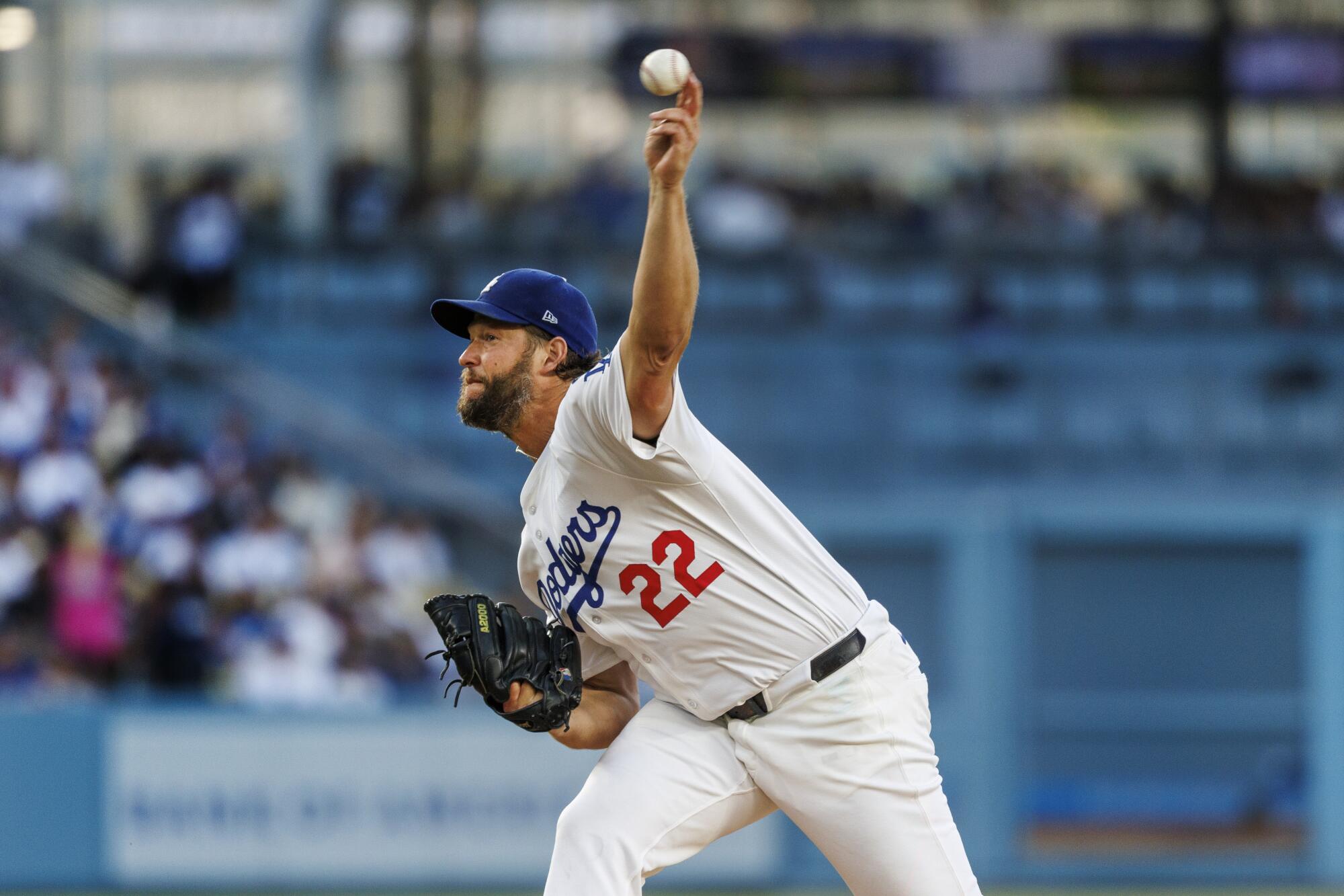 Dodgers pitcher Clayton Kershaw delivers in the first inning of a 6-5 win over the Washington Nationals on Friday night.
