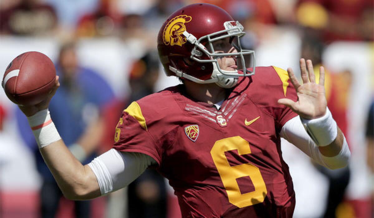 USC quarterback Cody Kessler completed 15 of 17 passes for 237 yards and two touchdowns in the Trojans' 35-7 victory over Boston College on Saturday.