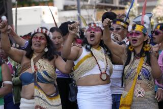 FILE - Waorani Indigenous women take part in a demonstration in Quito, Ecuador, Aug. 20, 2024, demanding authorities comply with the decision to halt oil drilling in a national park in the heart of the country's share of the Amazon where they live. (AP Photo/Dolores Ochoa, File)