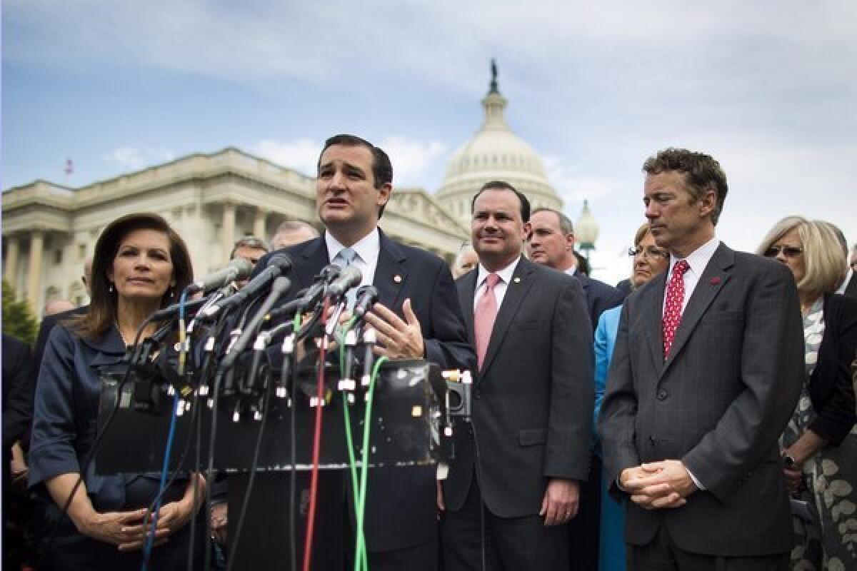 Republican Senator from Texas Ted Cruz, along with Republican Rep. Michele Bachmann, and Republican Senator from Kentucky Rand Paul, join Tea Party members to speak to the media about the IRS targeting of conservative groups in Washington.