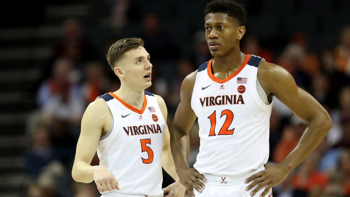 Kyle Guy (5) and De'Andre Hunter (12) have led Virginia to the No. 1 seed in the NCAA South Region.