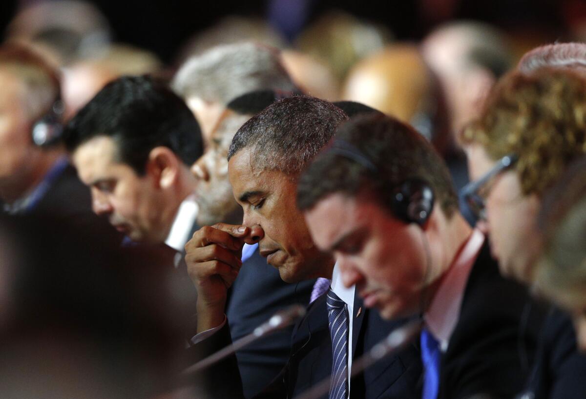 El presidente de Estados Unidos, Barack Obama (centro), durante la ceremonia inaugural de COP21, La Conferencia sobre Cambio Climático de Naciones Unidas, en Le Bourget, en las afueras de París, el 30 de noviembre de 2015.