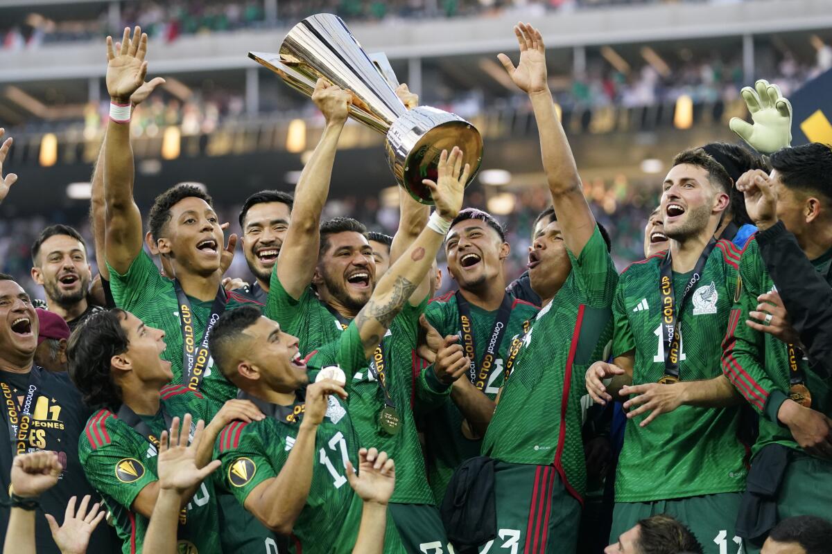Mexico players celebrate after defeating Panama to win the CONCACAF Gold Cup final.