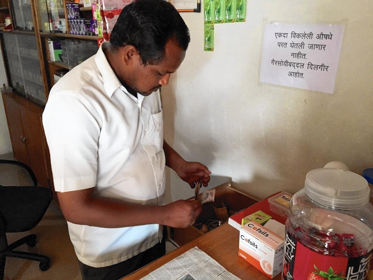 Indian shopkeeper Anil Bankar says he sometimes leaves money overnight in his register in Shani Shinganapur, even though the town is mostly door-free.