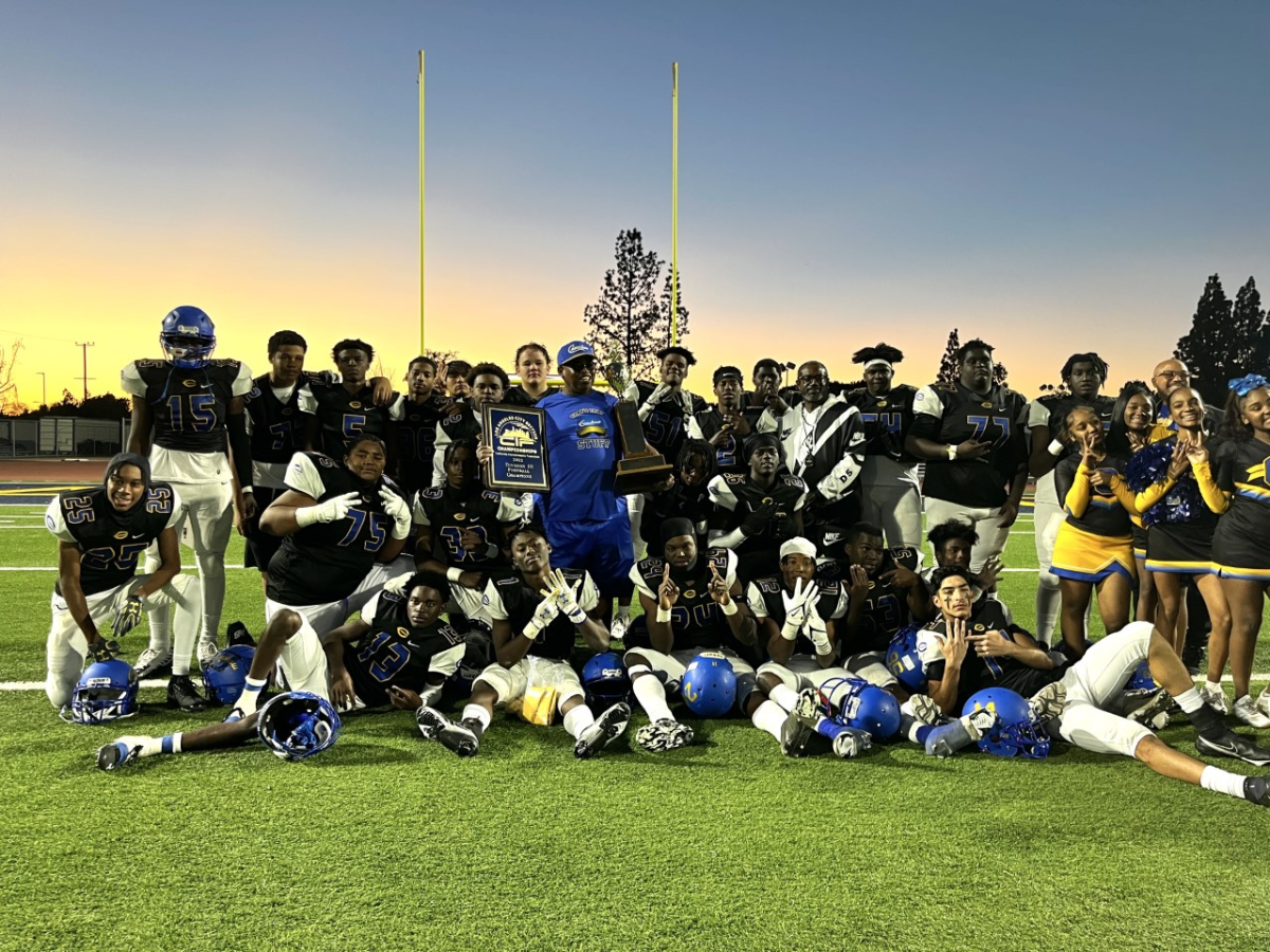 The Crenshaw football team celebrates after it beat Wilson 49-14 for the City Section Division III championship Friday.
