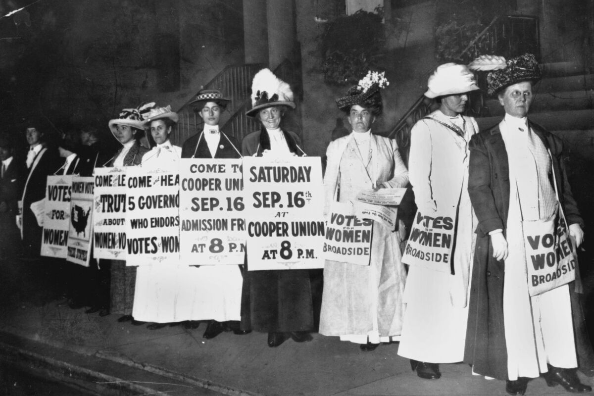 FILE - In this September 1916 file photo, demonstrators hold a rally for women's suffrage in New York. The Seneca Falls convention in 1848 is widely viewed as the launch of the women's suffrage movement, yet women didn't gain the right to vote until ratification of the 19th Amendment in 1920. (AP Photo)