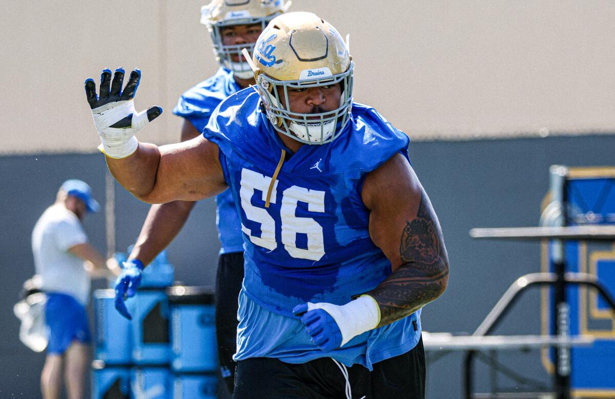UCLA offensive lineman Atonio Mafi takes part in Bruins training camp.
