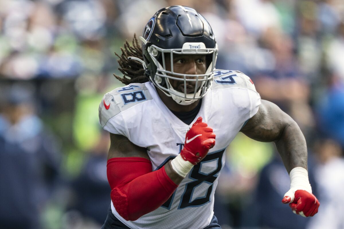 FILE - Tennessee Titans linebacker Bud Dupree is shown during the second half of an NFL football game against the Seattle Seahawks in Seattle, in this Sept. 19, 2021, file photo. Dupree says his mind, and pride, got ahead of his body as he ignored pain in the knee he tore his ACL last December. That’s why he hasn’t played the last two games and is trying to be smarter now he’s back practicing before Tennessee visits Jacksonville. (AP Photo/Stephen Brashear, File)