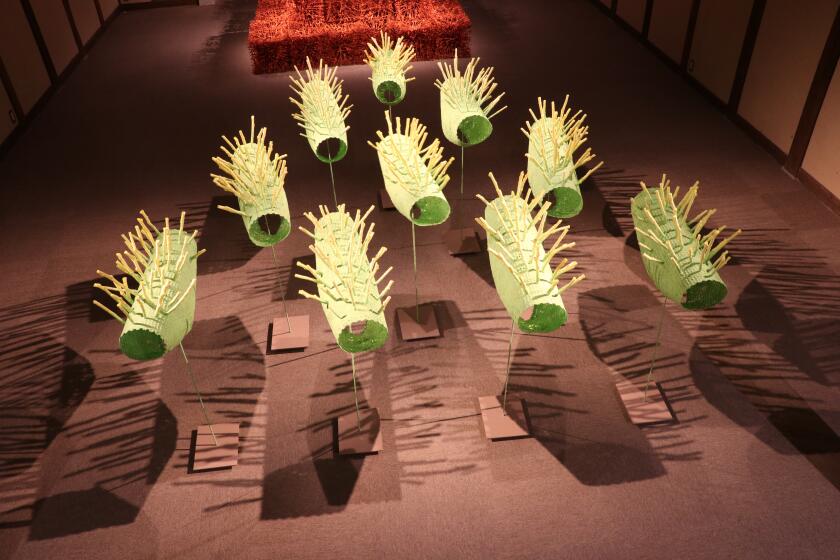 "Boat Island" by Takaaki Tanaka, a fiber paper art piece featured in Mingei International Museum's "Washi Transformed." 