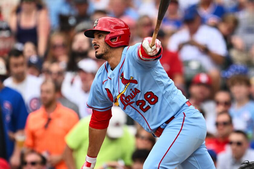 CHICAGO, IL - JULY 22: Nolan Arenado #28 of the St. Louis Cardinals bats against the Chicago Cubs.