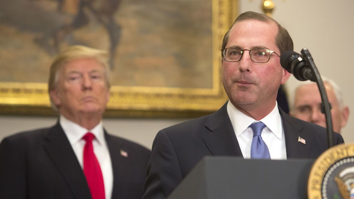 Alex Azar speaks after his swearing in as secretary of Health and Human Services in January, as President Trump looks on.