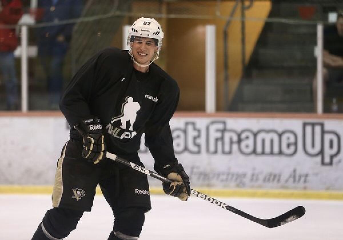 Sidney Crosby, shown during an informal workout with other locked-out NHL players earlier this month, played goalie in a rec league ball hockey game in Pittsburgh last week.