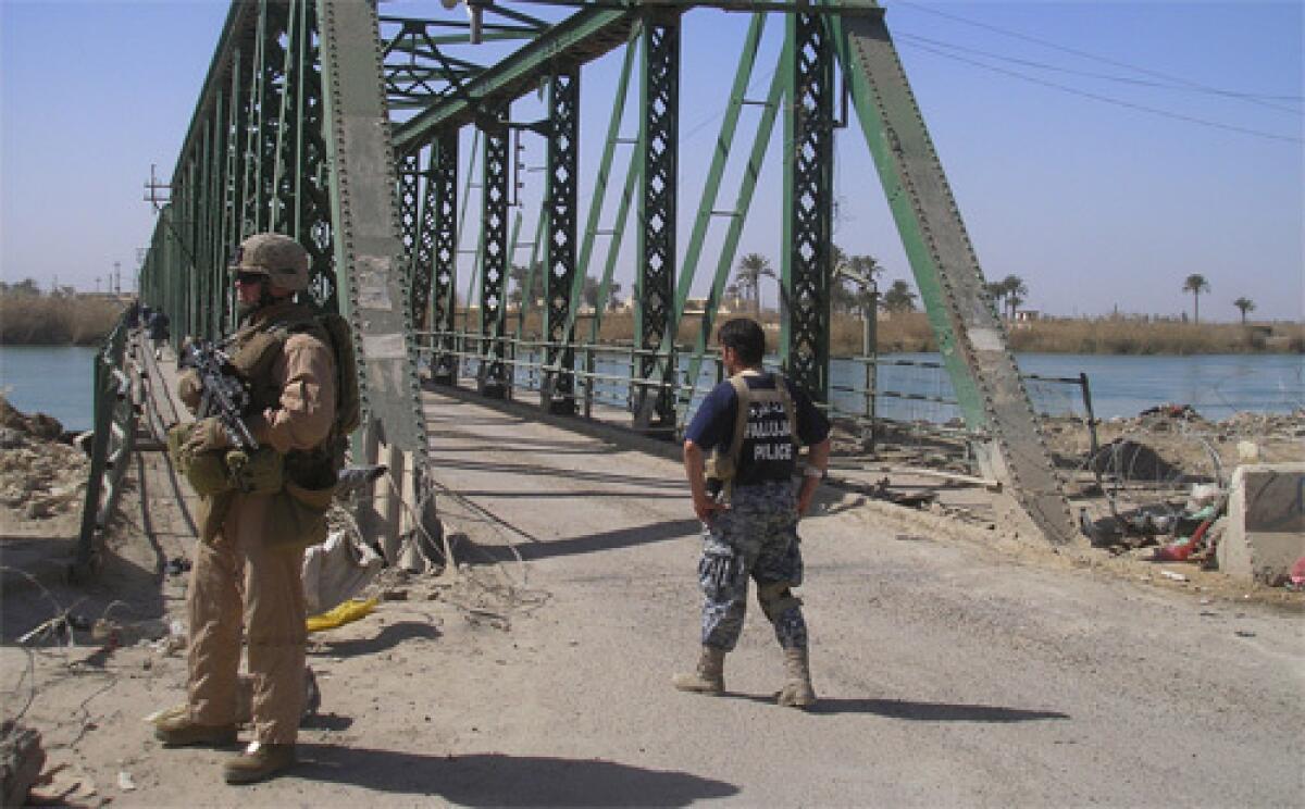 The bridge from which a mob hung the bodies of slain U.S. security workers in 2004 is a key part of Falloujas recovery. It is to be widened so more people can enter the city.