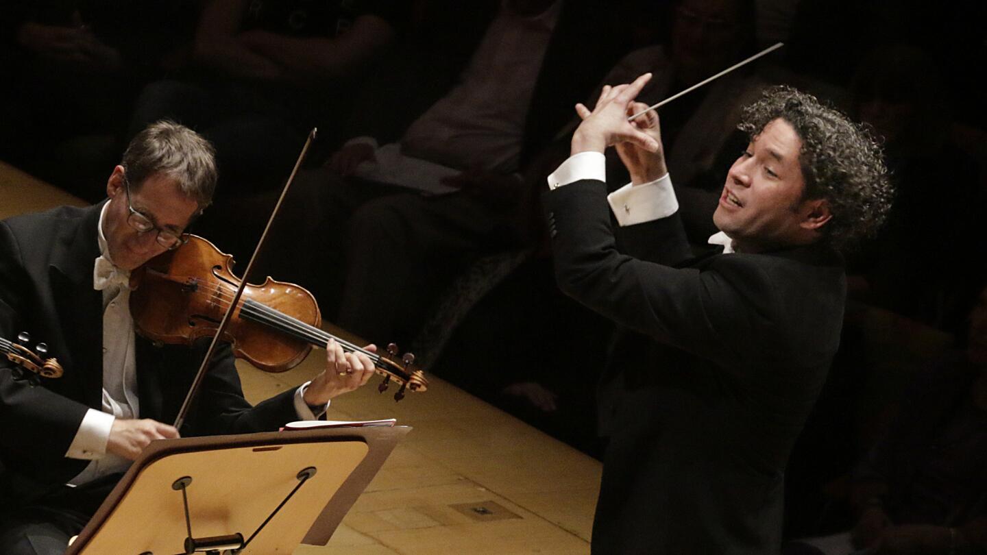 Gustavo Dudamel conducts the L.A. Philharmonic in a program Thursday that featured Ravel and the world premiere of Kaija Saariaho’s "True Fire."