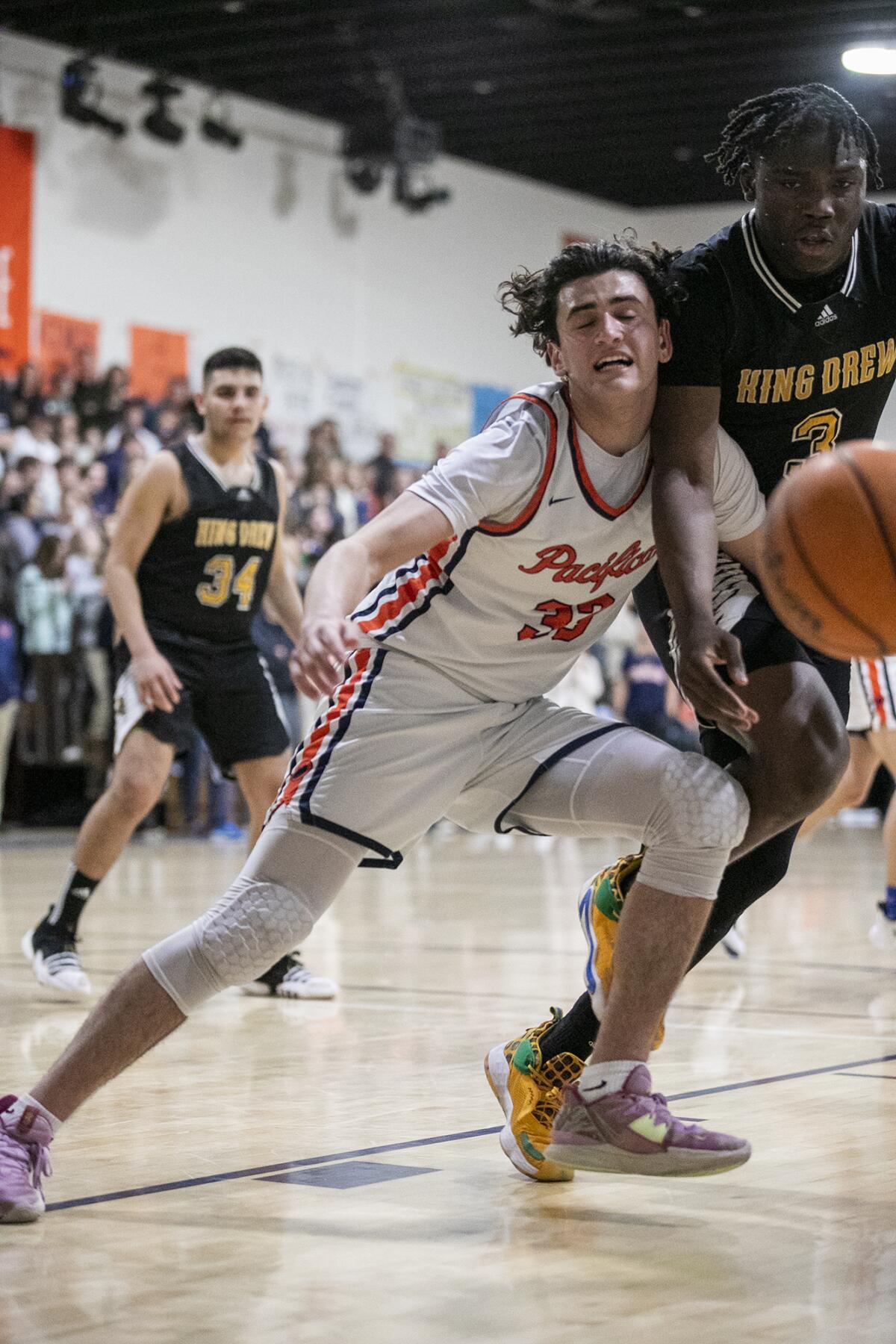 Pacifica Christian's Salim Semaan, left, battles with King-Drew's Chidubem Akametu on Thursday.