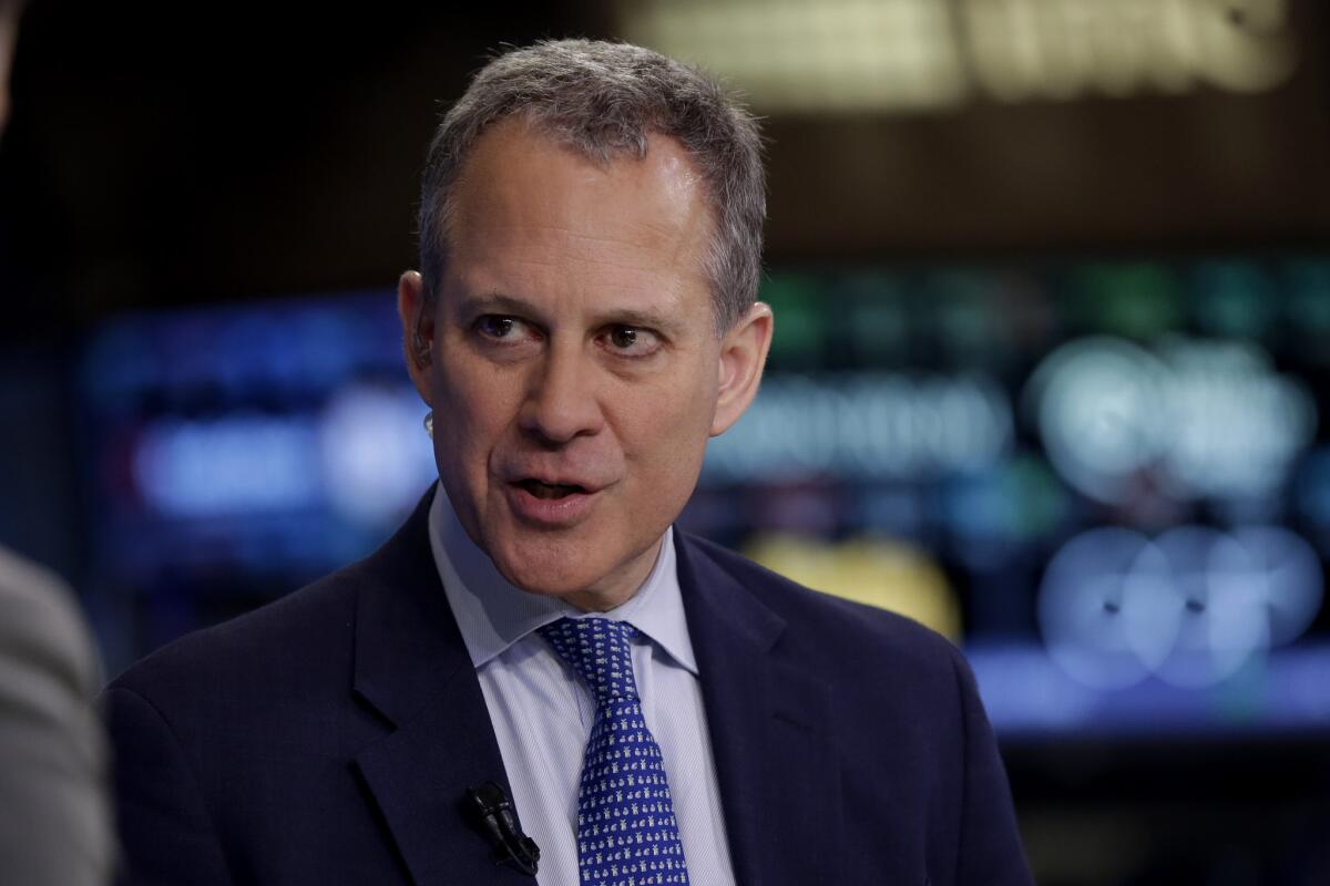 New York Atty. Gen. Eric Schneiderman is interviewed on the floor of the New York Stock Exchange on Aug. 21, 2014.