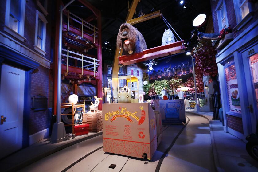 LOS ANGELES, CA - APRIL 15: Guests ride through rooms complete with tech-savvy animated figures, hyper-realistic media and projection mapping designed to take guests on a journey to meet some of their favorite characters of the newly opened attraction The Secret Life of Pets ride at Universal Studios Hollywood which reopened Thursday with safeguard considerations for the Coronavirus pandemic. Universal City Hollywood on Thursday, April 15, 2021 in Los Angeles, CA. (Al Seib / Los Angeles Times).