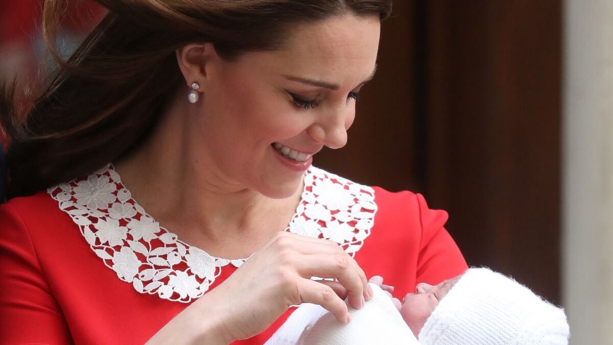 Catherine, Duchess of Cambridge, leaves St Mary's Hospital in London with her newborn son.