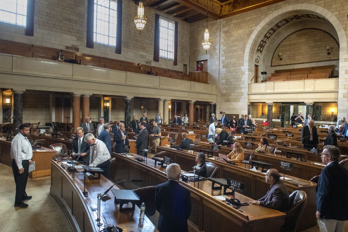 Nebraska state senators returned to the floor Monday for the first day of the special session on redistricting, Monday, Sept. 13, 2021, in Lincoln, Neb. (Justin Wan/Lincoln Journal Star via AP)