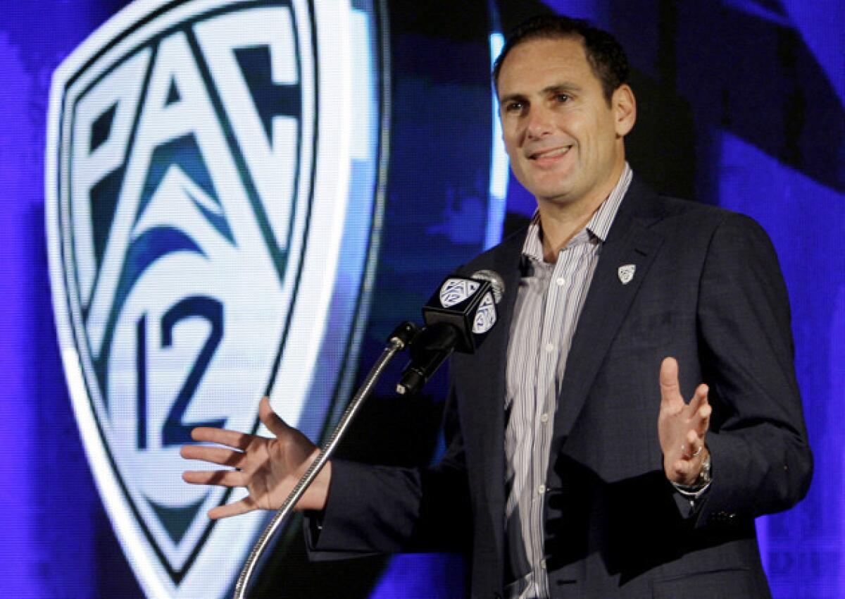 Pac¿12 commissioner Larry Scott talks during the Pac¿12 college football media day in 2011.