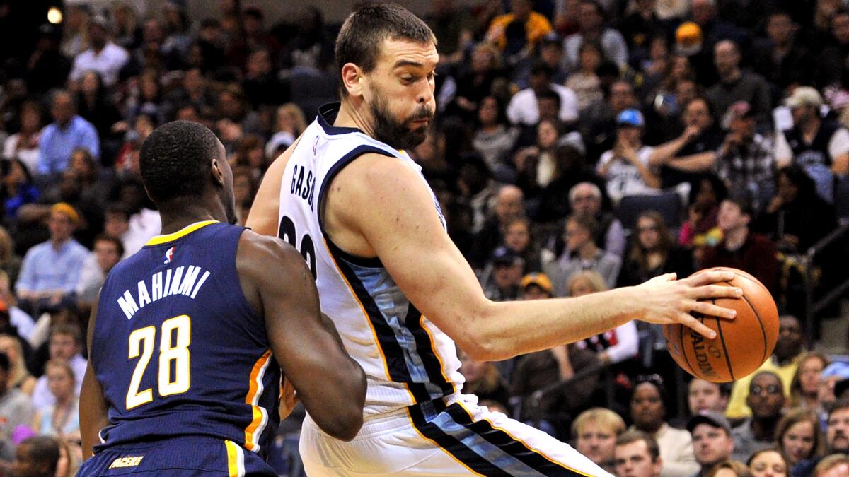 Grizzlies center Marc Gasol works in the post against Pacers center Ian Mahinmi during the first half of a game on Dec. 19.