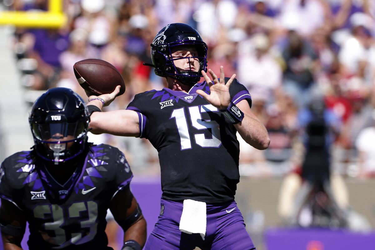 Max Duggan throws for Texas Christian.