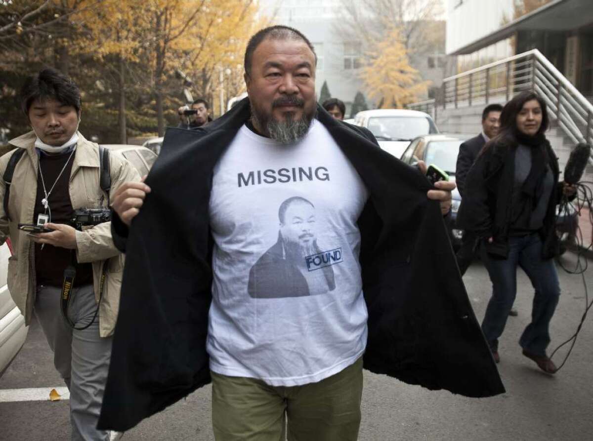 Artist Ai Weiwei in Beijing after his release from secret detention in 2011. The play "#aiww: The Arrest of Ai Weiwei" opens in London on April 11.