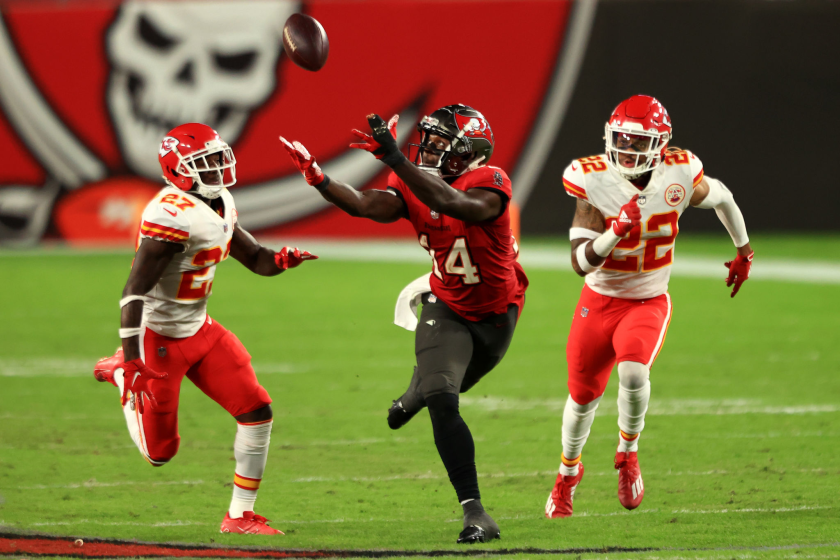 TAMPA, FLORIDA - NOVEMBER 29: Chris Godwin #14 of the Tampa Bay Buccaneers attempts.