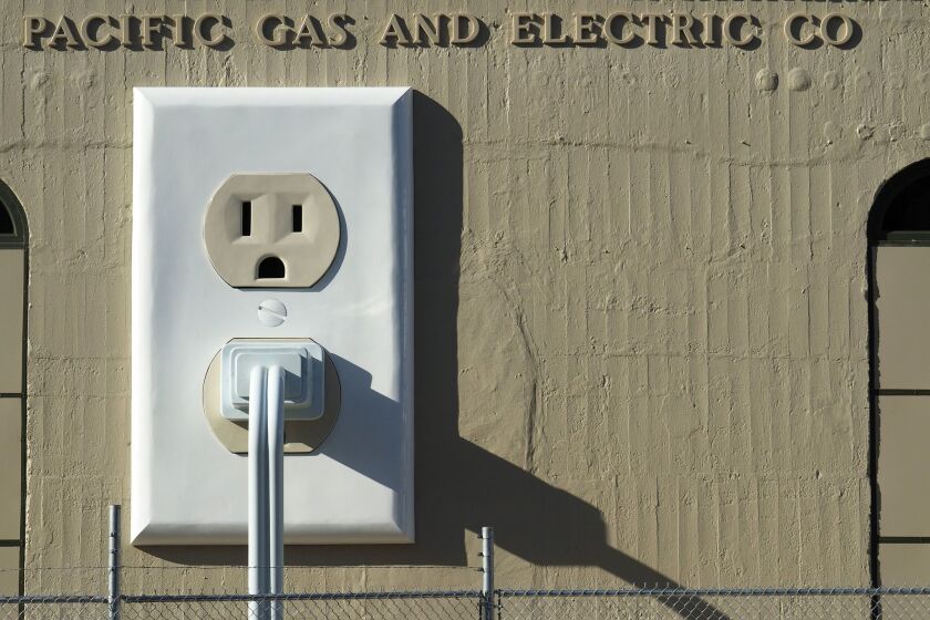 Mandatory Credit: Photo by JOHN G MABANGLO/EPA-EFE/REX (10056439a) (FILE) - An art installation entitled 'Outlet-plug-cord' (2015) by the art Basal Ganglia Studio is displayed on the side of a Pacific Gas and Electric (PG&E) sub-station utilities building in Petaluma, California, USA, 16 July 2015 (reissued 14 January 2019). US media reports on 14 January 2019 state the Pacific Gas and Electric (PG&E) is to file for bankruptcy on 29 January. The company is facing claims valued at several billion USD over the fatal Camp Fire in 2018, that caused the death of 86 people. Pacific Gas and Electric (PG&E) to file for bankruptcy, Petaluma, USA - 16 Jul 2015 ** Usable by LA, CT and MoD ONLY **