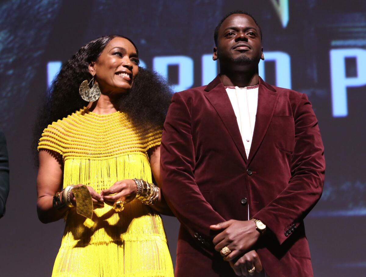 Angela Bassett and Daniel Kaluuya at the Los Angeles World Premiere of Marvel Studios' "Black Panther" at Dolby Theatre.