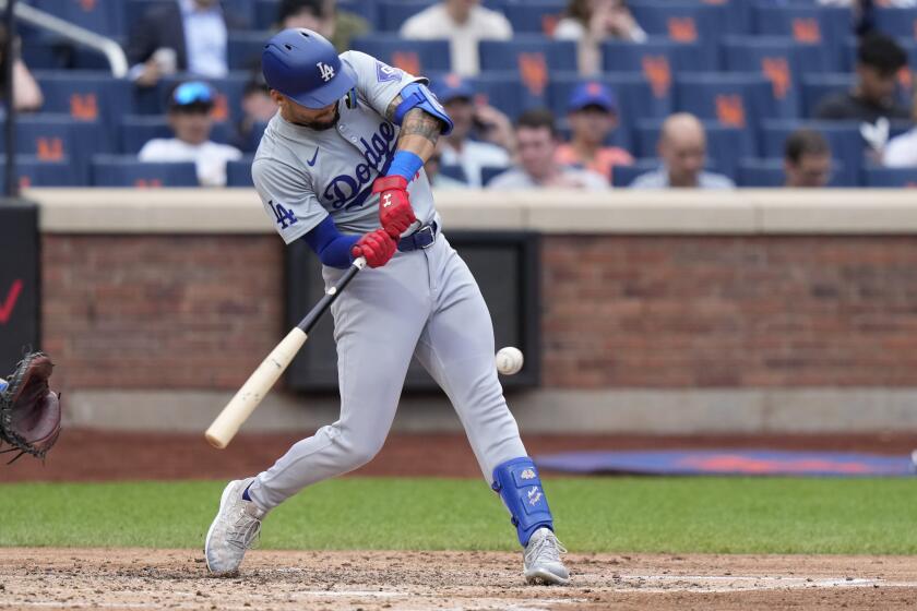 Los Angeles Dodgers' Andy Pages hits an RBI single during the fourth inning of a baseball game against the New York Mets, Wednesday, May 29, 2024, in New York. (AP Photo/Frank Franklin II)