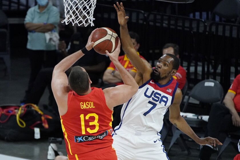 U.S. forward Kevin Durant blocks a shot by Spain center Marc Gasol.