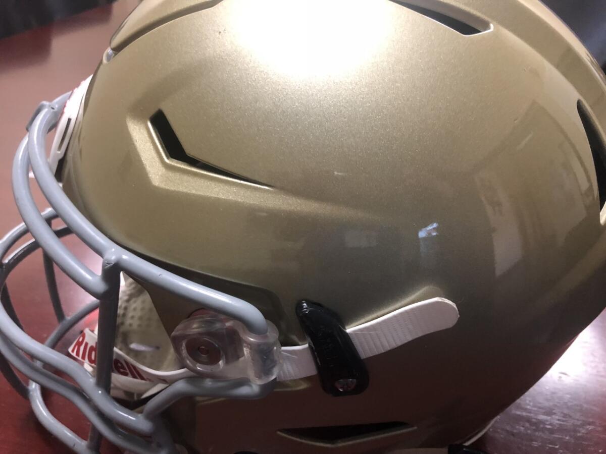 Close-up of a high school football helmet.