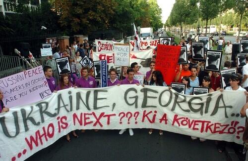 In a protest against the Russian military action in South Ossetia, demonstrators attend a rally in Hungary.