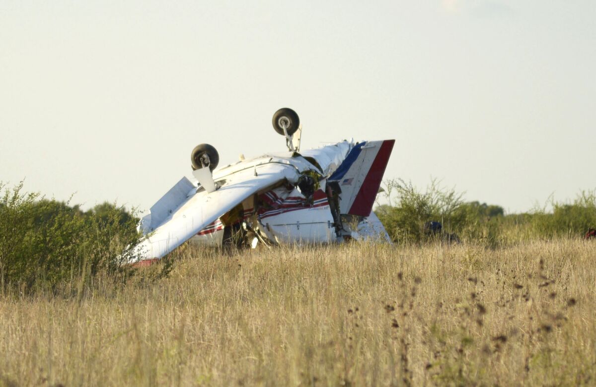 A plane is seen after crashing at Coulter Field in Bryan, Texas, Sunday, Aug. 30, 2020. (Darren Benson/College Station Eagle via AP)