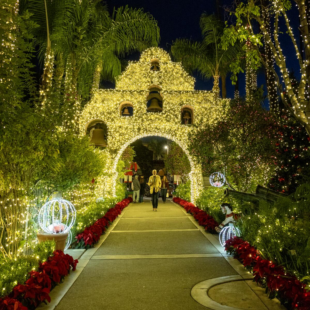 The entryway at a historic hotel shows off some of its extravagant holiday lights.