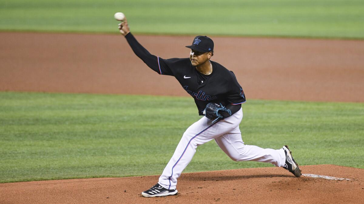 Miami Marlins starting pitcher Elieser Hernandez throws during the first inning of the team's baseball game against the Tampa Bay Rays, Saturday, April 3, 2021, in Miami. (AP Photo/Gaston De Cardenas)