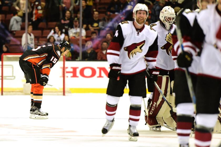 Ducks forward Ryan Getzlaf reacts after his giveaway at center ice resulted in an overtime goal by Mikkel Boedker to give the Coyotes a 4-3 win.
