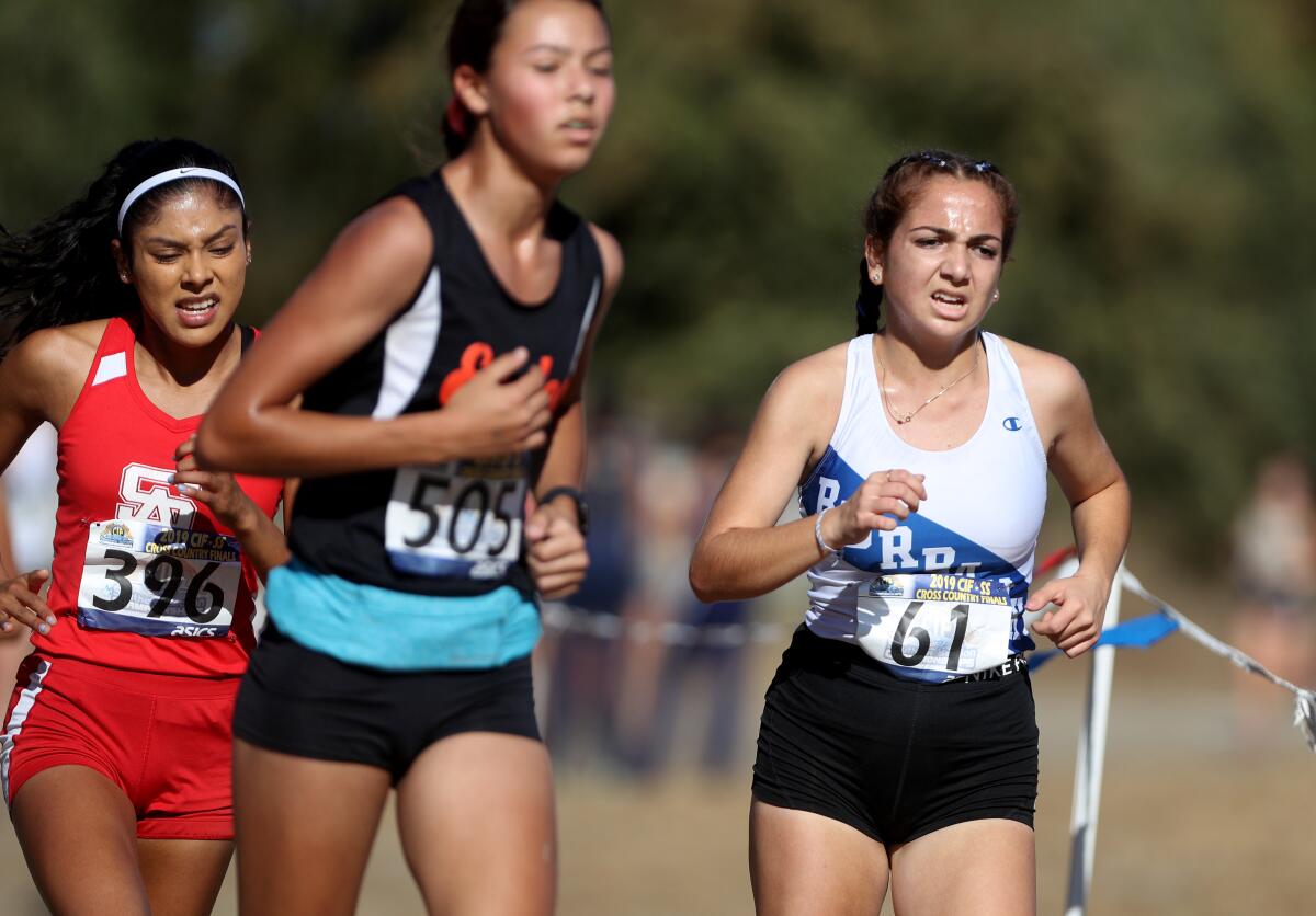 Burbank junior Elin Markarian ran in the girls division 1 CIF Southern Section Cross Country Finals, at Riverside City Cross-Country Course in Riverside on Saturday, Nov. 23, 2019.