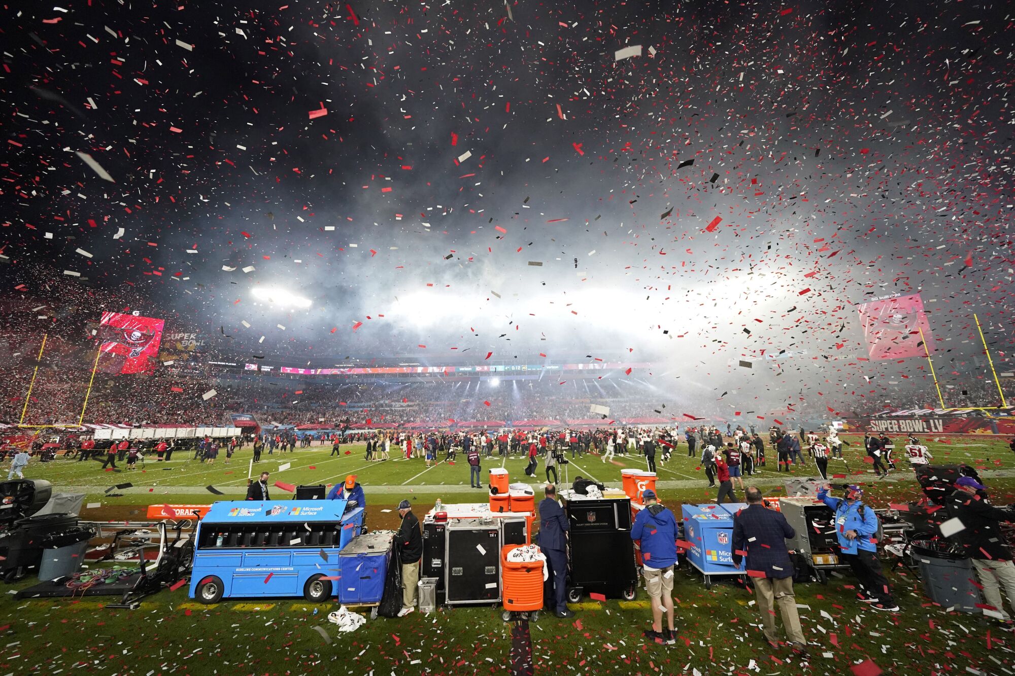 Confetti flies over the field at Raymond James Stadium after Super Bowl LV.