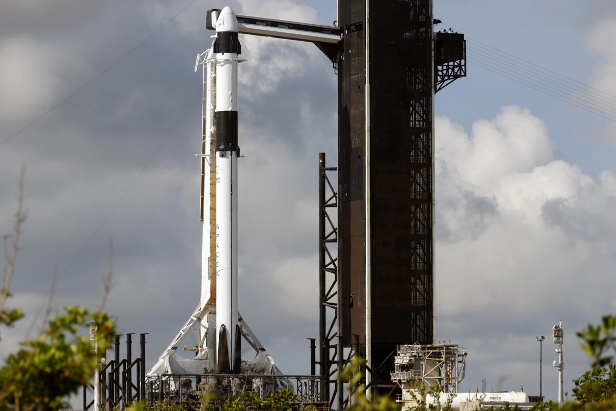 A SpaceX Falcon 9 rocket stands ready for launch 