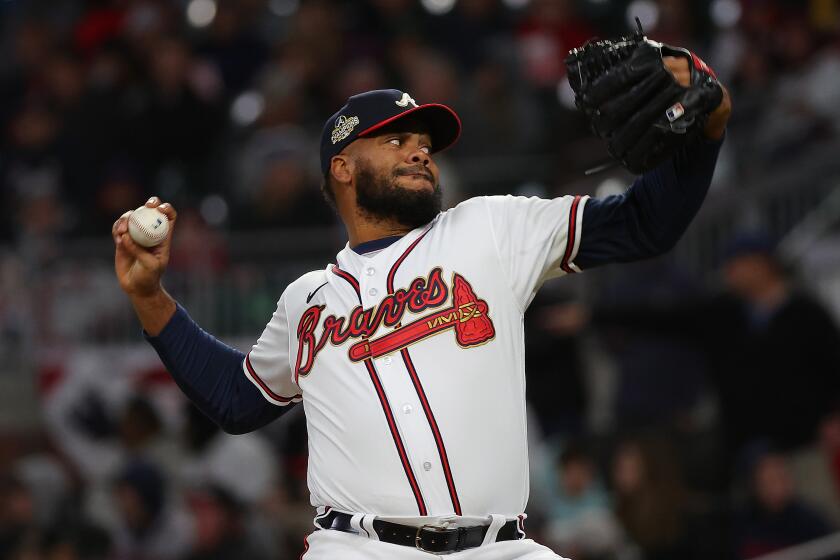 ATLANTA, GEORGIA - APRIL 08: Kenley Jansen #74 of the Atlanta Braves pitches.