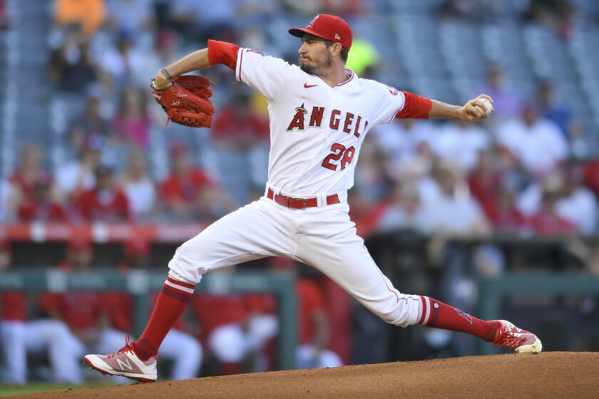 Los Angeles Angels starting pitcher Andrew Heaney throws during the first inning of a baseball game against the Colorado Rockies Wednesday, July 28, 2021, in Anaheim, Calif. (AP Photo/John McCoy)
