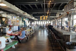 The interior of the Windmill Food Hall in Carlsbad on Aug. 2, 2023.