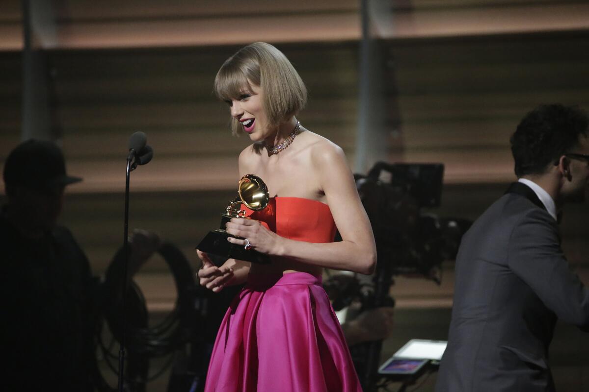 Taylor Swift wins record of the year at the at the 58th Grammy Awards.