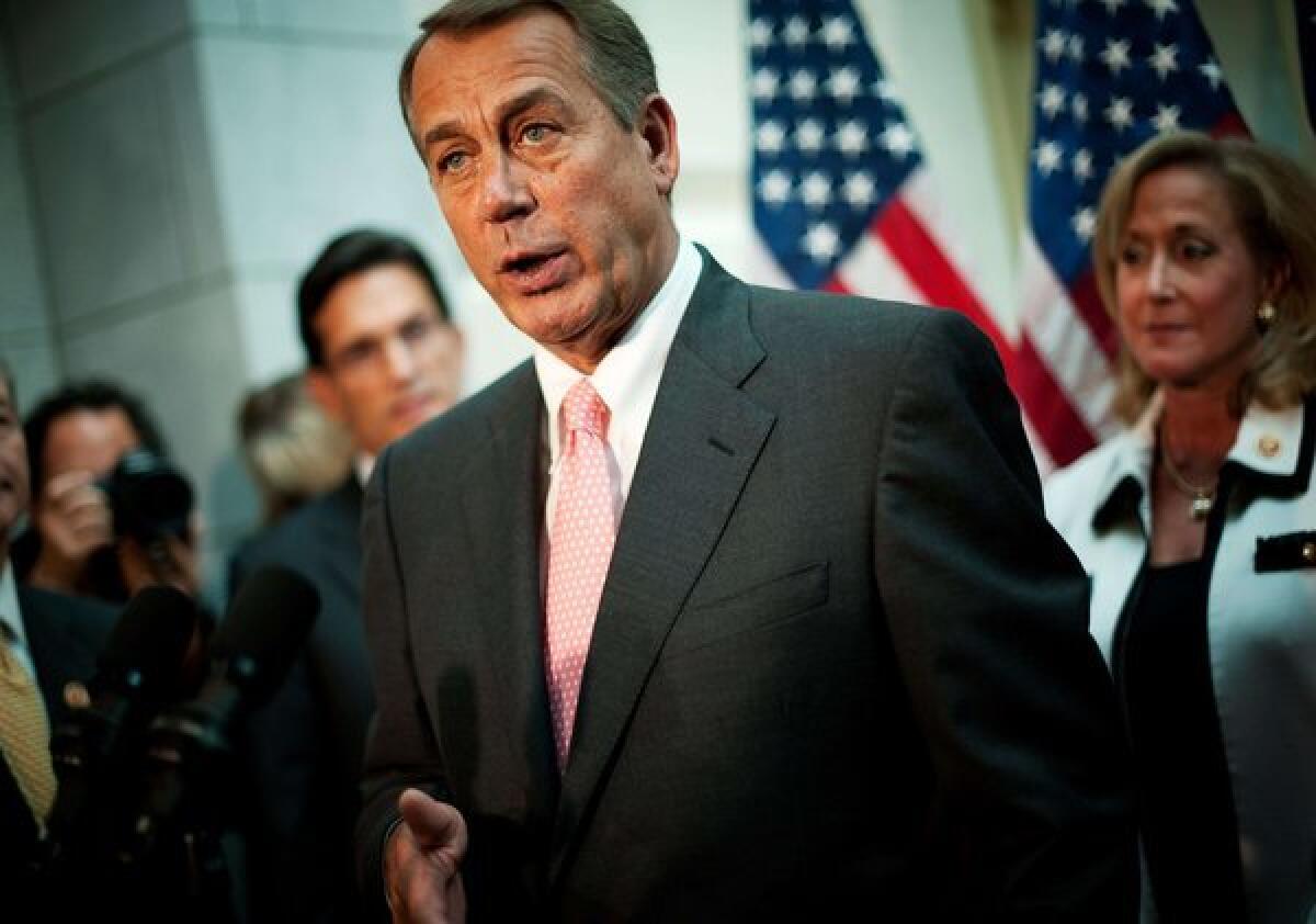 House Speaker John A. Boehner (R-Ohio) speaks during a news conference in Washington on Thursday.