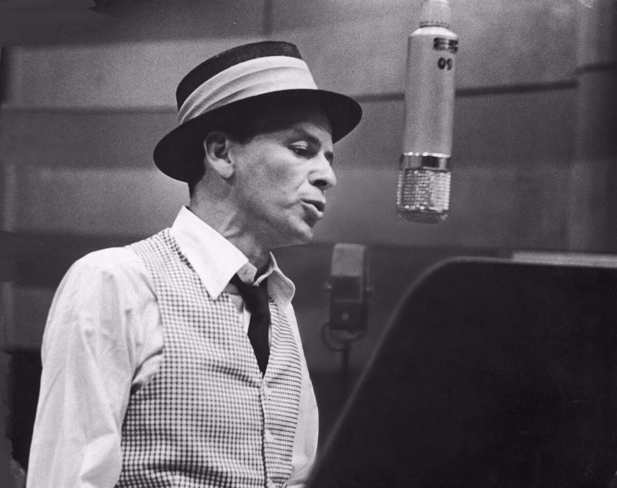 American singer and actor Frank Sinatra (1915-1998) during a 1953 recording session at Capitol Records in Hollywood.