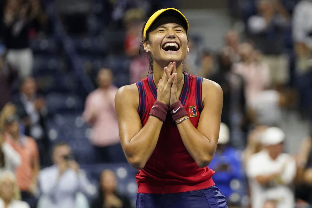 Emma Raducanu, of Great Britain, reacts after defeating Maria Sakkari, of Greece, during the semifinals of the US Open tennis championships, Thursday, Sept. 9, 2021, in New York. (AP Photo/Frank Franklin II)