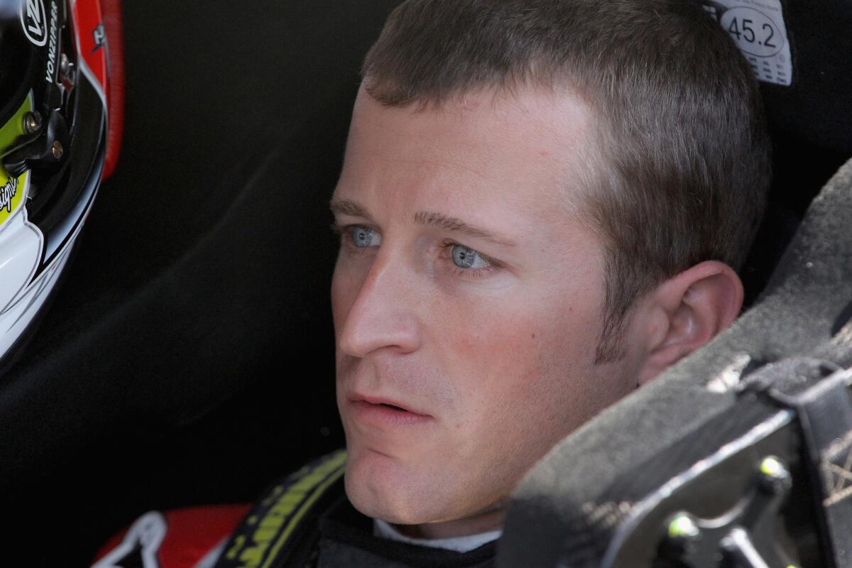 Kasey Kahne sits in his car on June 6.