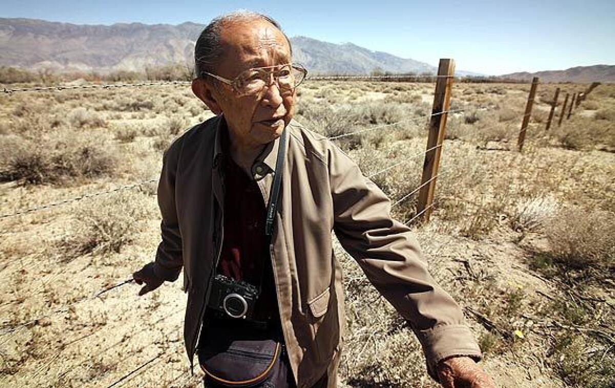 Archie Miyatake, 84, looks to the Sierra Mountains as he recalls how he and fellow internees sneaked past guard towers to fish for rainbow trout while confined at the Manzanar War Relocation Center near Lone Pine. He was 16 when he and his family arrived there from Los Angeles.